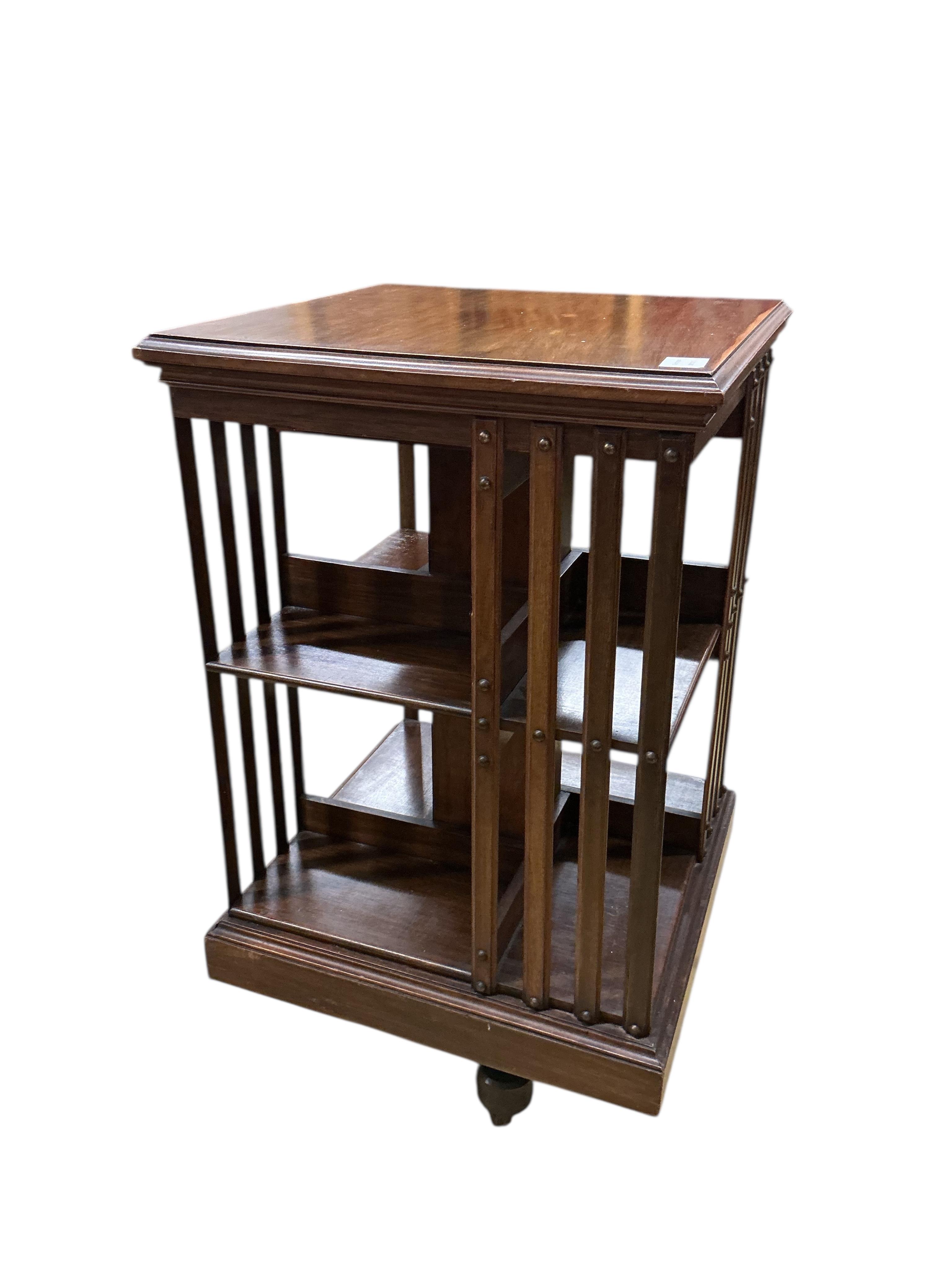 An early 20th century mahogany revolving bookcase, width 49cm, depth 49cm, height 86cm